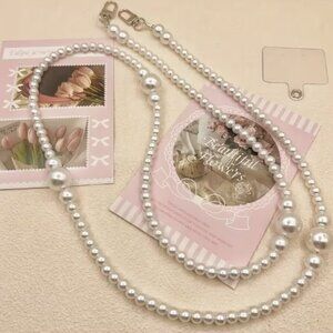 Mobile phone lanyard long crossbody . NWT